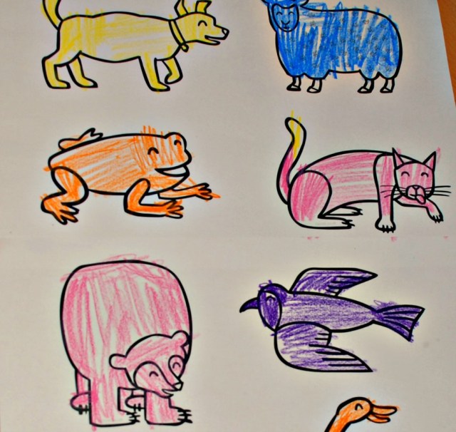 The Brown Bear Brown Bear black and white stick puppets downloaded from Twinkl and coloured in by the kids