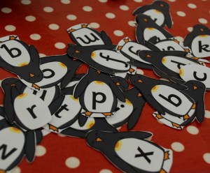 penguins with letters on