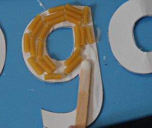 Letter g with pasta