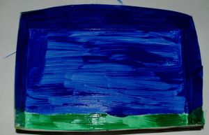 Cereal box painted to be used as background for Hama bead picture