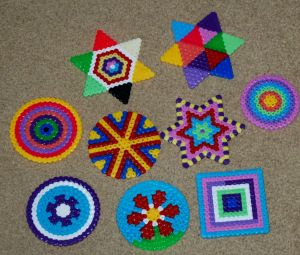 Different Hama Bead coasters made by kids on ofamilyblog