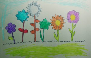 Laimating sleave flower scene picture traced from colouring page found on the Twinkl website idea found on ofamilyblog