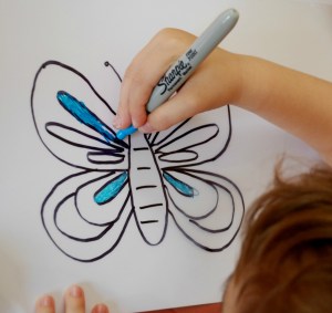 Making a laminating pouch window art, great activity for young kids