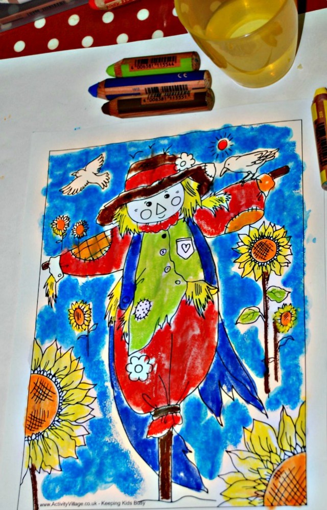 Activity Village Scarecrow colouring page completed using STABILO 3-in-1's dipped into water