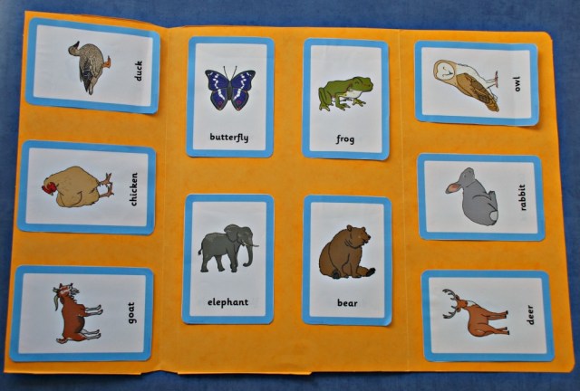 Animal and their Young folder create using Free to download matching cards from Twinkl Resources