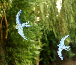 Swallows flying drawn onto a sliding door using a template from Activity village
