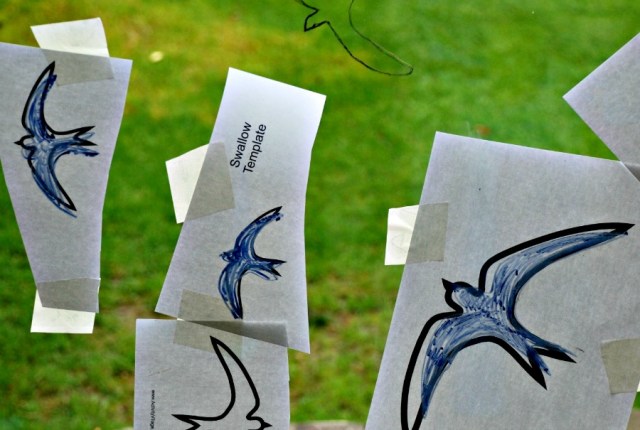 Swallows traced over a template taped onto the outside of the sliding doors