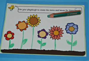 Using STABILO 3-in-1 pencils on laminated playdough mats on ofamilyblog