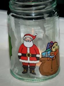 Christmas bottle with Santa and a bag full of presents