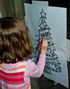 Christmas tree tracing over the Twinkl template using STABILO pencils