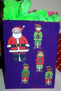 Christmas boxes - Santa and his elves using Twinkl stick puppet images