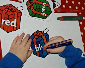 Christmas presents with the colours written on them Free from twinkl