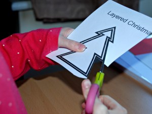 Cutting out the tree template from Activity village