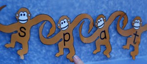 Monkey spelling using Activity village cut-outs