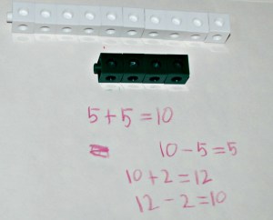 snap cubes to show relationship between addition and subtraction