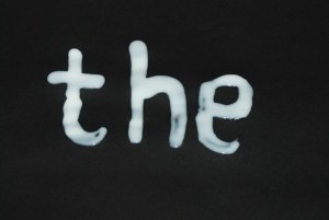 Sand words - trace over the letters with glue first