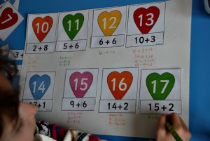 Writing out our own number posting showing the relationship between addition and subtraction