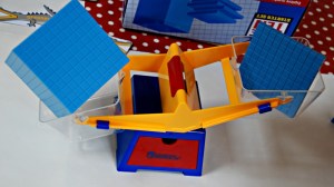 Comparing 1000 to 100 using base 10 set and scales from Learning reources