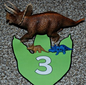 Dinosaur addition using baby dinosaurs