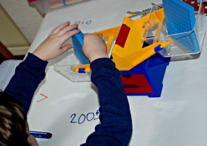 weighing big numbers to work our which one is greater than