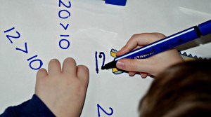 writing out numbers after weighing the base 10 set