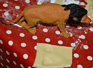 baking- animal footprints using a toy lion