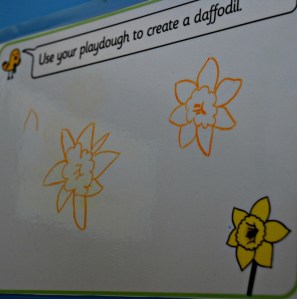 Drawing flowers on the Twinkl play dough mats
