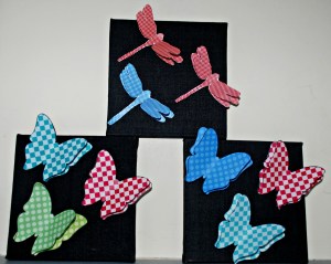 3D wall art featuring butterflies and dragonflies