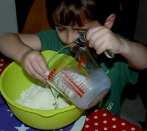 Helping with the pouring when making scones