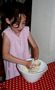 using their hands to mix the dough is a great tactile activity for children