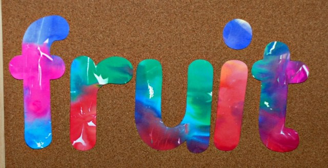 word made using paper created with bleeding tissue paper and their stencils