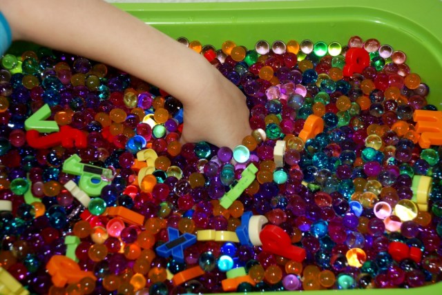 finding letters in a tub of water beads