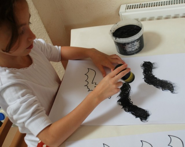 dabbing-over-the-bat-templates-with-black-paint