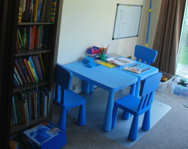 home-ed-area-kids-play-area-with-bookcase-and-table-and-chairs-for-them-to-use