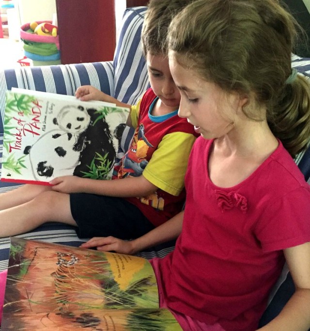 reading-their-nature-storybooks-on-the-couch-tigress-and-tracks-of-a-panda