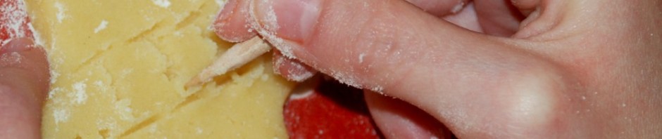 Writing Roman Numerals onto some cookies. Fun activity to do when learning Roman Numerals