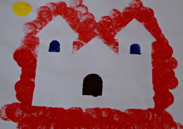 Haunted house art activity using a template and paint dabbers