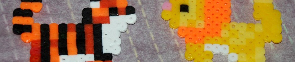 fusion bead tiger and lion made from the Baker Ross kits