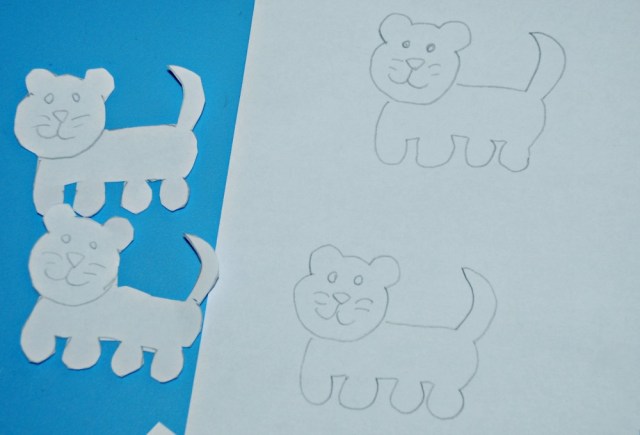 Drawing lion cubs to make stick puppets with