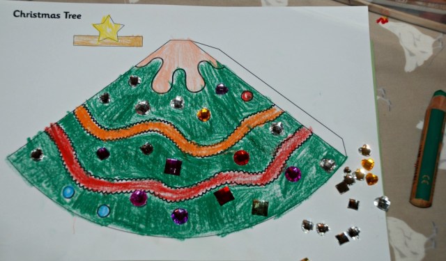 Twinkl Cone Christmas tree with some crafty jewels added as decorations