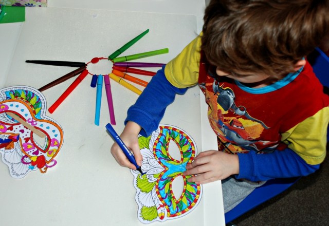 Mardi Gras masks from Activity Village being coloured in using STABILO Cappi Pens