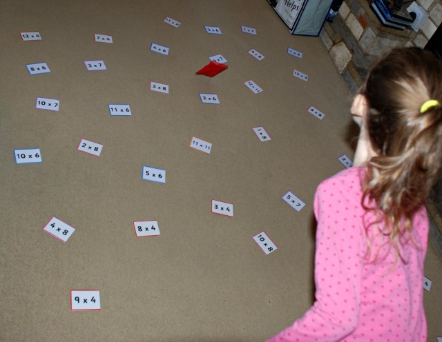 Throwing their bean bags onto a sum and then answering the sum it lands on