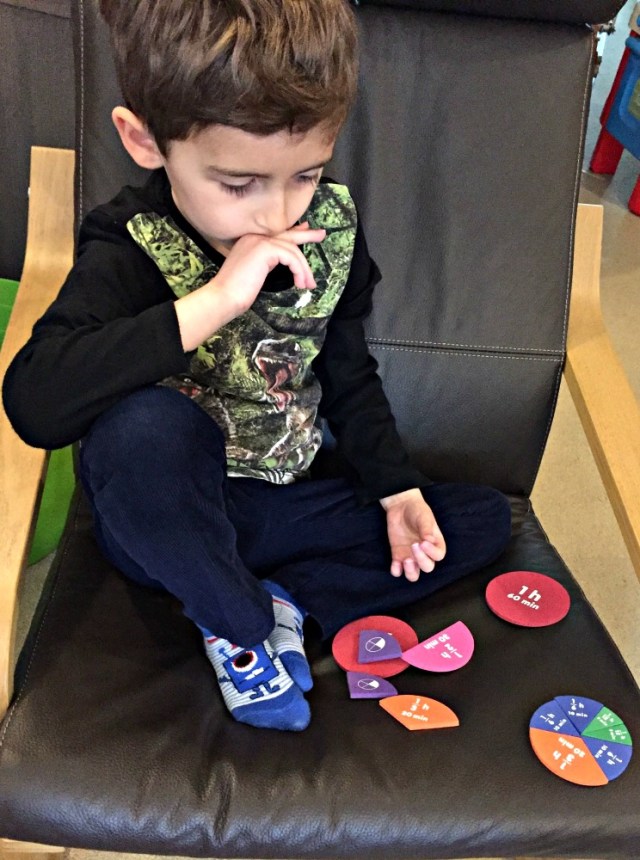 Learning Resources About Time set. The kids love using the facrtion pieces to work out what makes up an hour