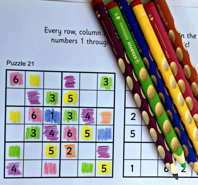 An Activity Village for kids Sudoku puzzle solved used coloured pencils