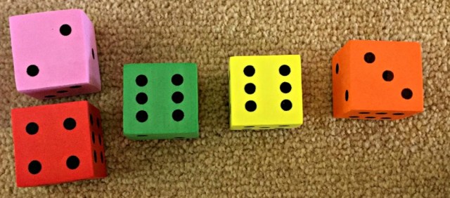 Grouping numbers together to make sums easier using foam dice
