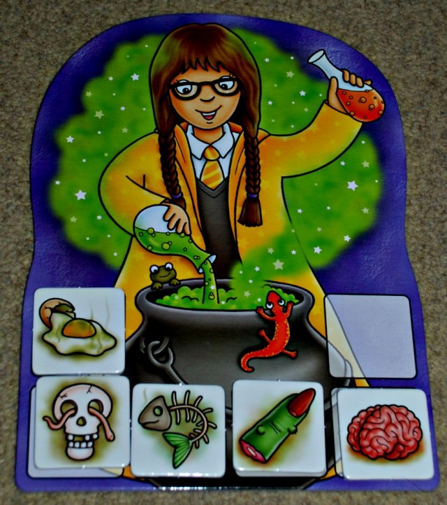 Magic Maths game by Orchard Toys. The aim is to fill your board with ingredients by answering some maths sums