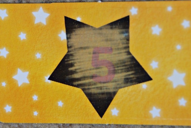 Magic Maths by Orchard Toys. If you rub the star of the reverse side of the sum card the answer will appear