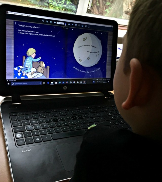 Reading the Twinkl orginal story Back to Earth with a Bump. A lovely eBook which you can download as part of a Twinkl subscription