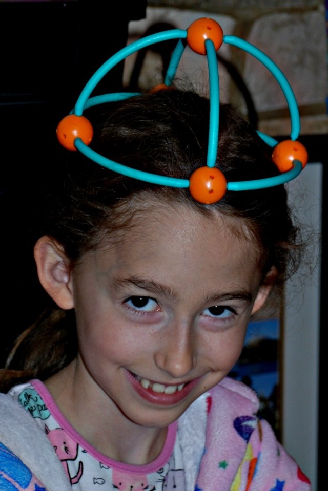 Dive into Shapes building their own creations like a crown