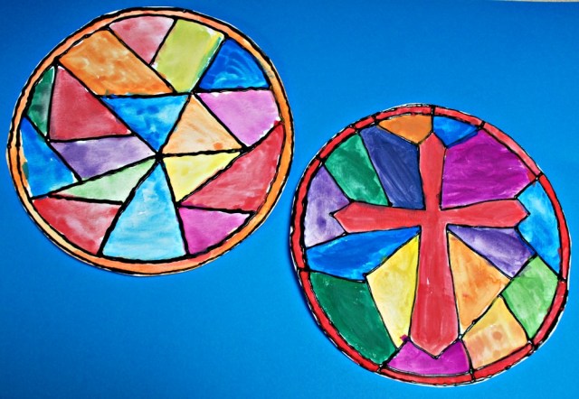 Stained glass window art activity for children. Fun painting project using watercolour paints and some dimensional paint